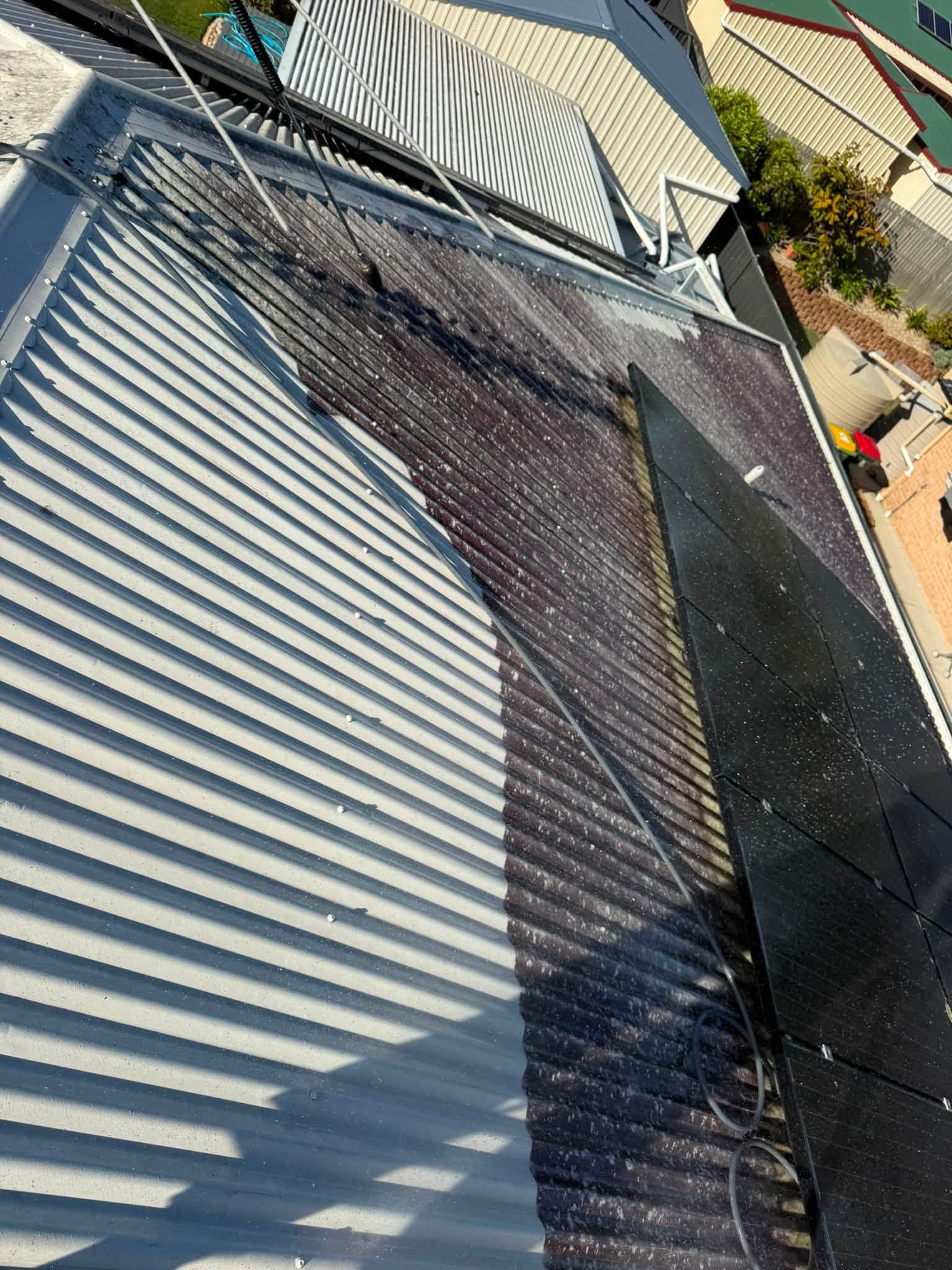 Soft washing solar panels and roof, Wilson Pressure Washing